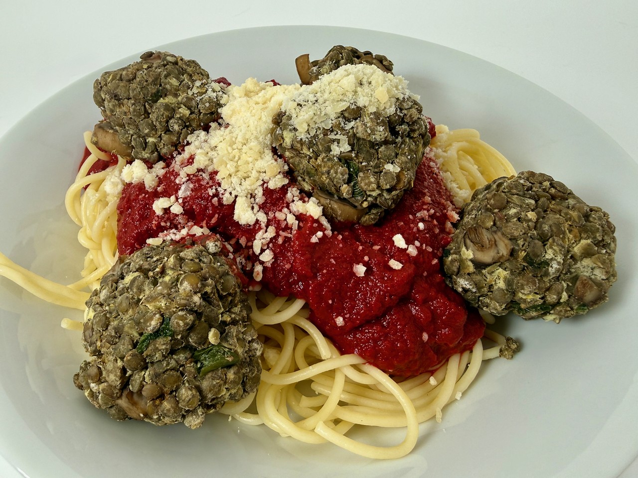 Spaghetti with no-tomato red sauce and "meatballs"