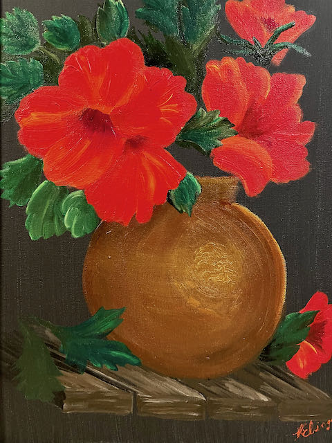 Red-orange flowers in vase